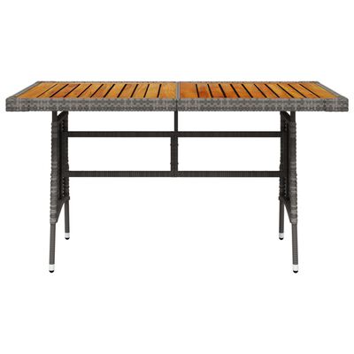 vidaXL طاولة حديقة رمادي 130×70×72 سم بولي روطان وخشب أكاسيا صلب